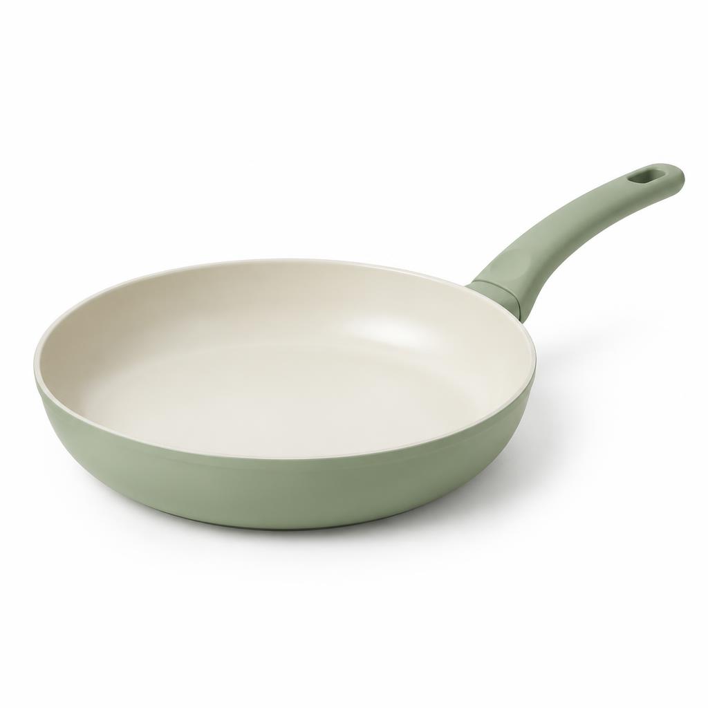Jasna ceramiczna patelnia z zielonym uchwytem